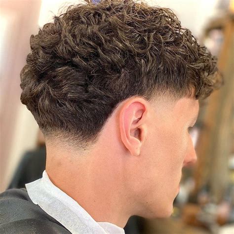 taper fade curly hair.